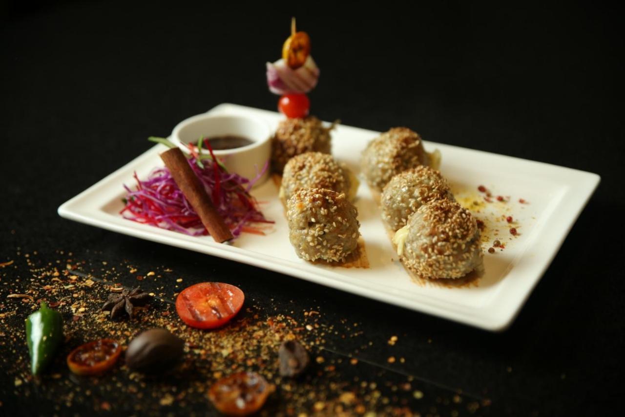 Park Lane Hotel Lahore Extérieur photo Aubergine kebab