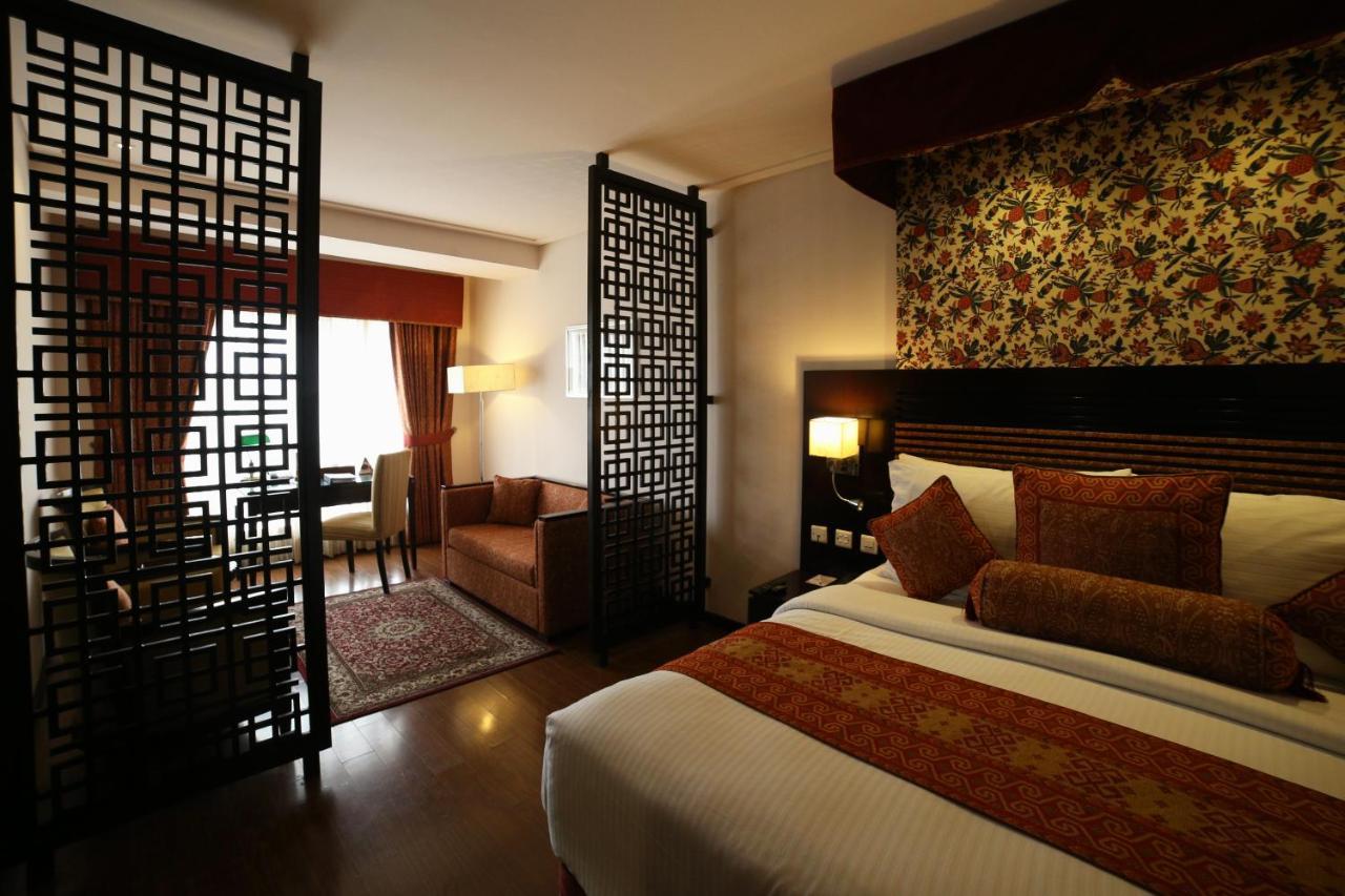Park Lane Hotel Lahore Extérieur photo A room at the Taj Bengal